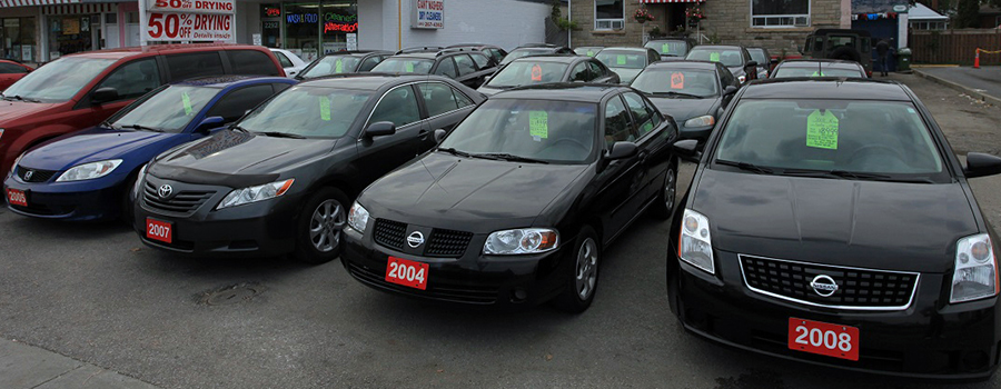 A photo of parking lot full of used cars at KS car Sales